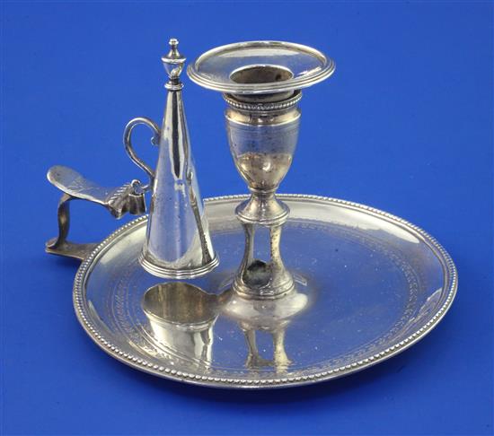 A George III silver chamberstick and snuffer, 9.5 oz.